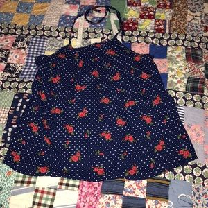 Cute little top. Roses with lace detail...